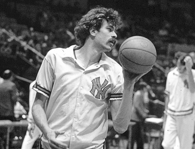 In this undated file photo, New York Knicks' Phil Jackson warms up for an NBA basketball game. (AP Photo/File).