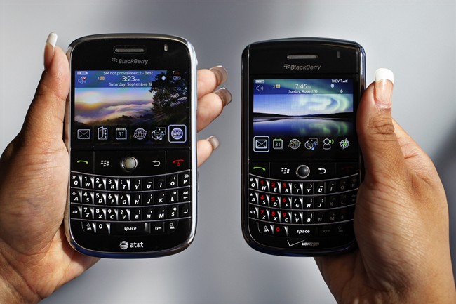 In this Monday, Sept. 21, 2009, file photo, a BlackBerry Bold, left, and Tour, right are photographed in Mountain View, Calif., Monday, Sept. 21, 2009.