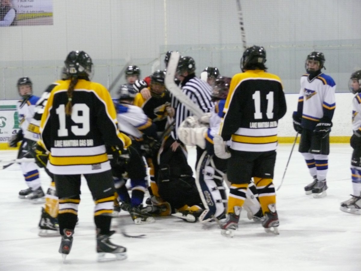 A Global News viewer took these photos of a brawl at a hockey game in Stonewall, Man., on Sunday.