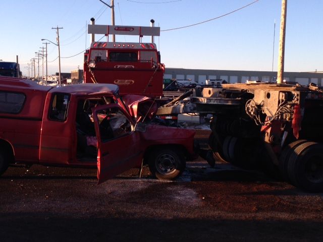 A man was airlifted to hospital after the pickup truck he was driving hit the flat deck of a semi west of Edmonton, Monday, Mar. 10, 2014. 