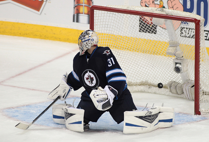Ondrej Pavelec of the Winnipeg Jets can't make the stop on a goal by Alec Martinez of the Los Angeles Kings at the MTS Centre on Thursday.