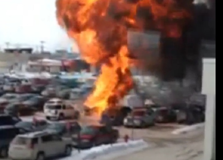 Van explodes in parking lot on Sargent Ave. in Winnipeg on Monday, March 3, 2014.