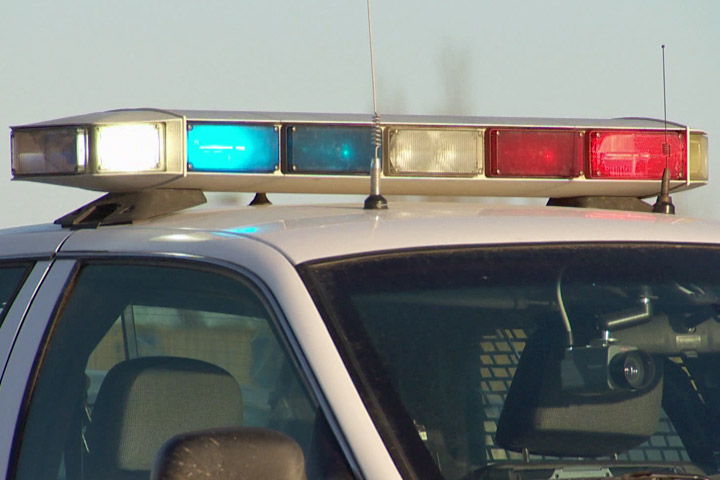 A Saskatoon police officer was narrowly missed by a truck during a traffic stop on Wednesday.