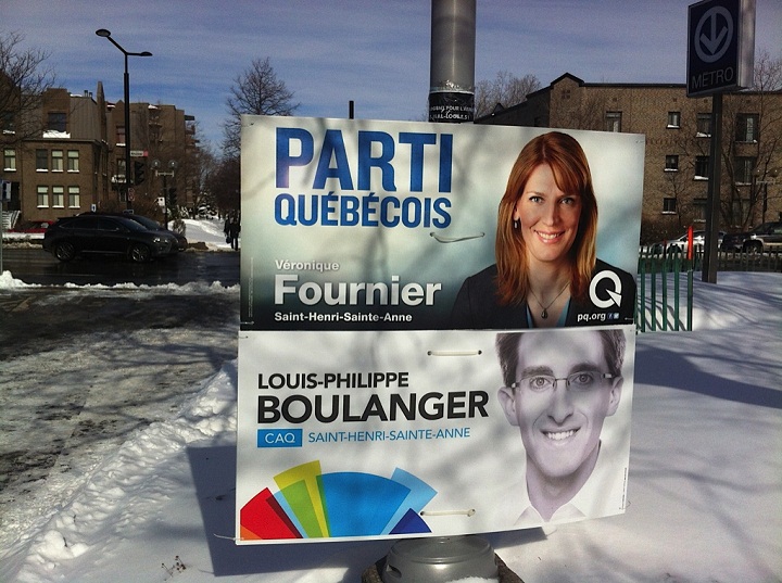 Parti Quebecois and Coalition Avenir Quebec election signs in Montreal.