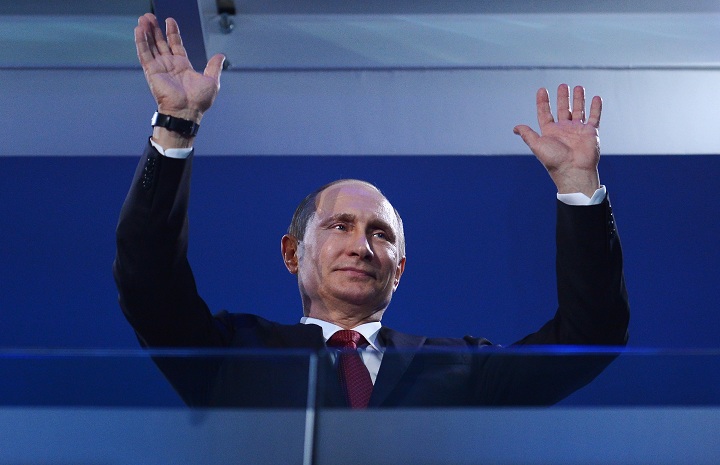 Russia President Vladimir Putin waves during the Sochi 2014 Paralympic Winter Games Closing Ceremony at Fisht Olympic Stadium on March 16, 2014 in Sochi, Russia. 