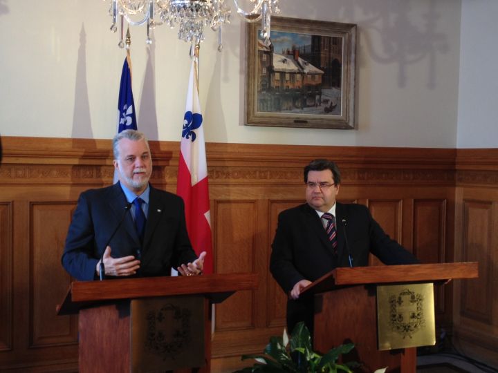 Liberal leader Philippe Couillard and Montreal mayor Denis Coderre during joint press conference Wednesday, March 26, 2014 at city hall. 