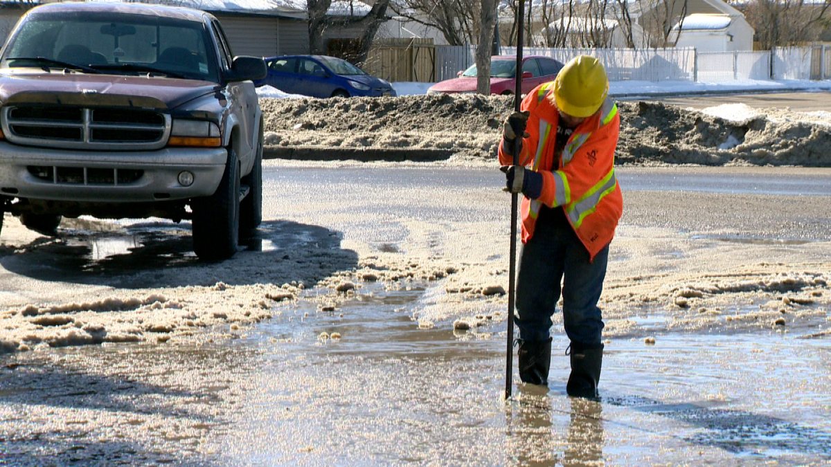 City crews have started clearing ice and snow around Regina as the warm weather is expected to impact storm drains.
