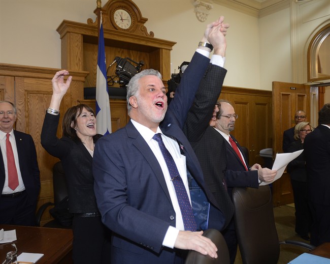 Quebec Liberal leader Philippe Couillard cheers during his campaign launch in Quebec City on Wednesday March 5, 2014.