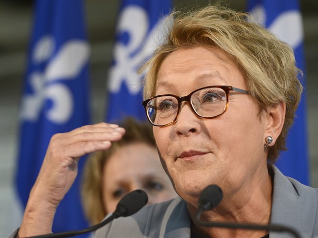 Parti Quebecois Leader Pauline Marois speaks during a news conference at a metal training school in Montreal on Friday March 14, 2014.