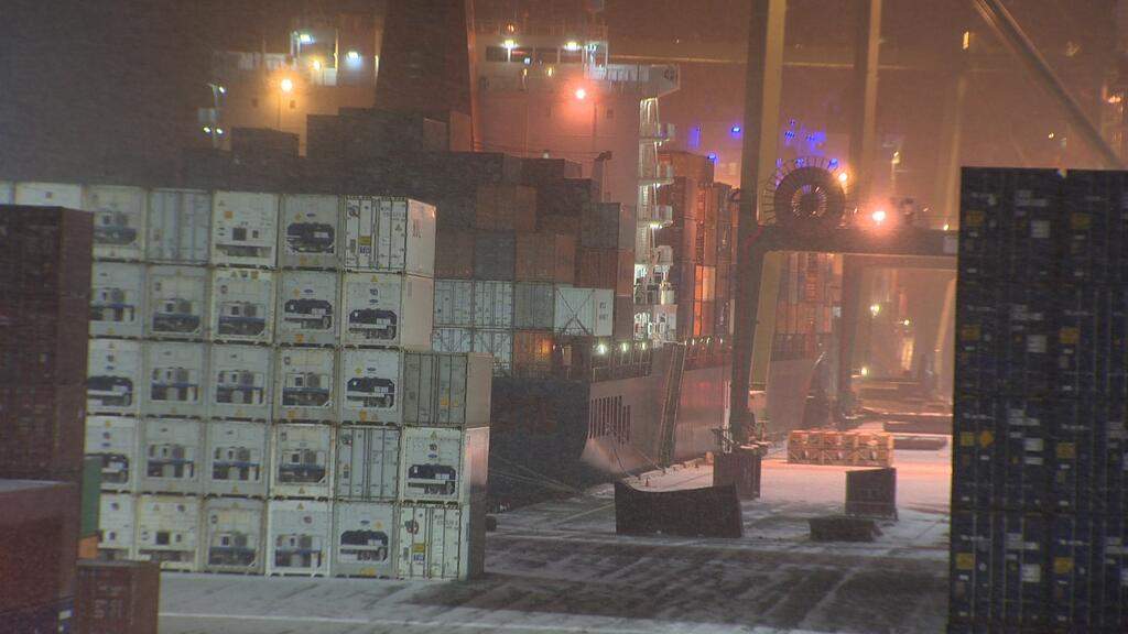 Canada's nuclear safety agency says cylinders carrying radioactive material fell during unloading in Halifax because one end of a shipping container they were in wasn't properly secured to a crane.