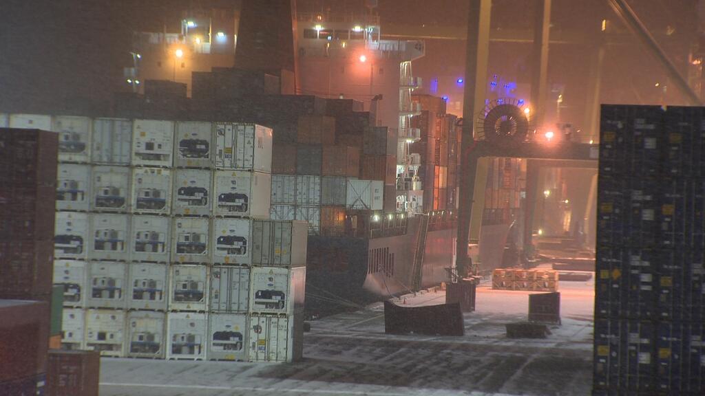 Canada's nuclear safety agency says cylinders carrying radioactive material fell during unloading in Halifax because one end of a shipping container they were in wasn't properly secured to a crane.