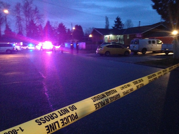Police on the scene of a shooting in Surrey on March 16, 2014.