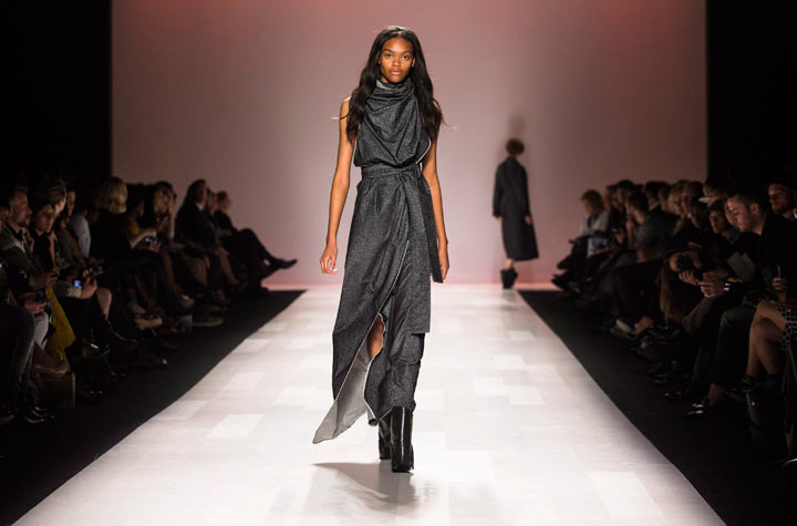 A model walks the runway in the Sid Neigum show during Toronto Fashion Week in Toronto, Tuesday October 22, 2013. 