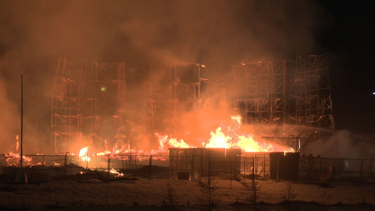 A massive blaze destroys a condo in south west Edmonton, Saturday, March 15, 2014. 