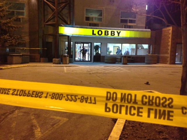 Police tape surrounds an Edmonton hotel after a man is found suffering from stab wounds in the area, Wednesday, Mar. 12, 2014. 