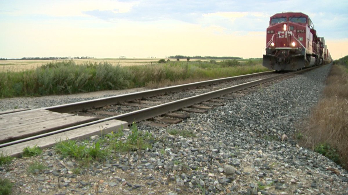 A report on a train-van collision in Saskatchewan that killed four people warns there could be similar tragedies unless passive rail crossings have better systems to alert drivers to potential danger.