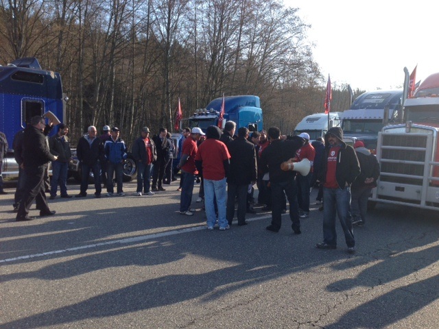 Truckers plan to hold a rally in protest of back-to-work legislation - image