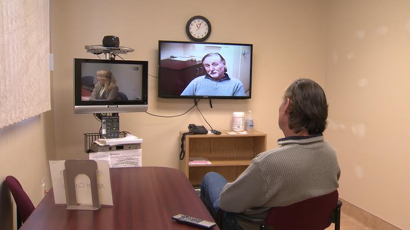 Keith Steeves, who suffers from PTSD, speaks to his clinical nurse through video conferencing. Steeves is in Riverside-Albert, while his nurse is in Fredericton.