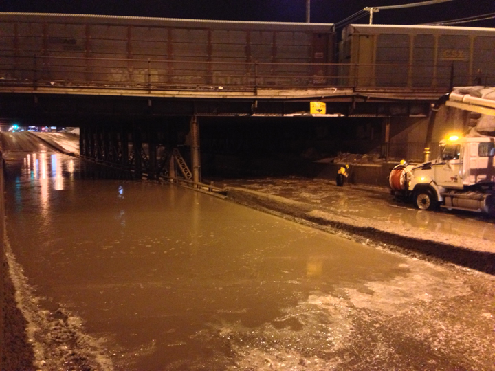 Water has flooded McPhillips Street underpass below the Canadian Pacific Railway line.