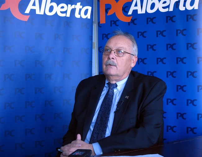 Jim McCormick, then president of the Progressive Conservative Party of Alberta, speaks to reporters in Calgary, Tuesday, March 18, 2014. 