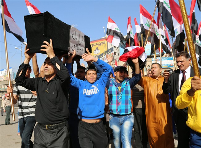 Suicide bomber uses Iraq police Humvee in attack - image