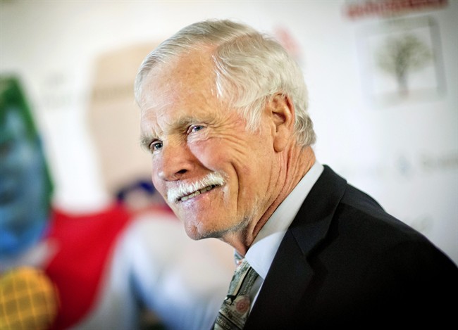  In this Friday, Dec. 6, 2013 file photo, American media mogul Ted Turner is photographed on the red carpet at the Captain Planet Foundation benefit gala in Atlanta. 