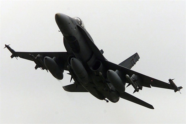 A Canadian CF-18 fighter takes off from CFB Trenton in this October 11, 2001 file photo.