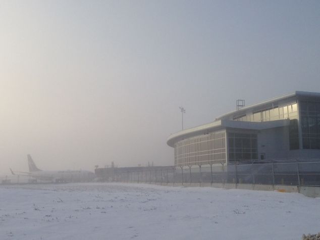 Fog causes delays at Edmonton International Airport on Thursday, April 3, 2014.