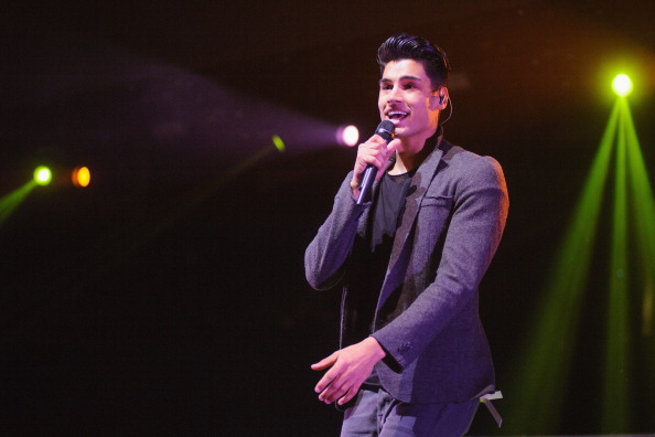 Siva Kaneswaran of The Wanted performs during the B96 Pepsi Jingle Bash at Allstate Arena on December 14, 2013 in Chicago, Illinois.  (Photo by Timothy Hiatt/Getty Images for Radio.com).