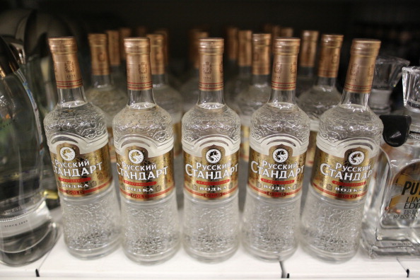 Bottles of Russian Standard vodka, produced by Russian Standard Corp., stand for sale inside a Lenta Ltd. supermarket in Moscow, Russia, on Tuesday, Feb. 25, 2014. 