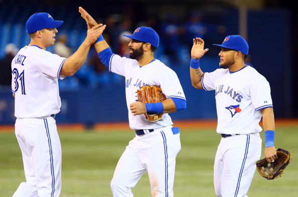 The Toronto Blue Jays celebrate the win over the Houston Astros during MLB action at the Rogers Centre April 8, 2014 in Toronto, Ontario, Canada.  (Photo by Abelimages/Getty Images).