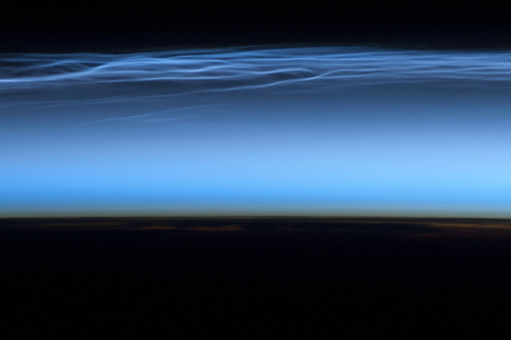 Noctilucent clouds, as seen from the International Space Station.