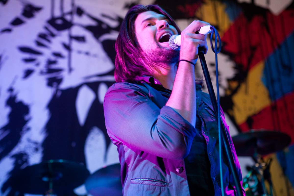 Lead singer Adam Lazzara of Taking Back Sunday performs at the Virgin Mobile FreeFest on August 30, 2009 in Columbia, Maryland.