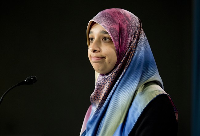 Sarah Attia, wife of Khaled Al-Qazzaz, attends a news conference Tuesday April 29, 2014 in Ottawa. 