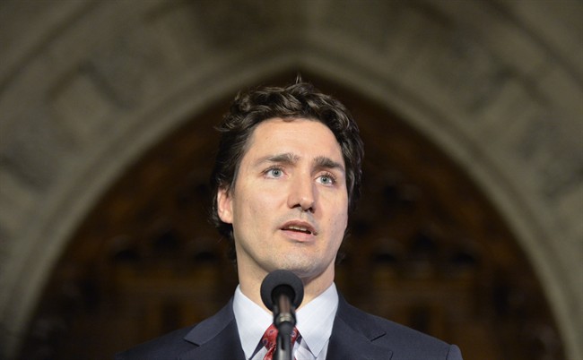 Liberal leader Justin Trudeau speaks in the foyer of the House of Commons on Parliament Hill Tuesday April 8, 2014 in Ottawa. 