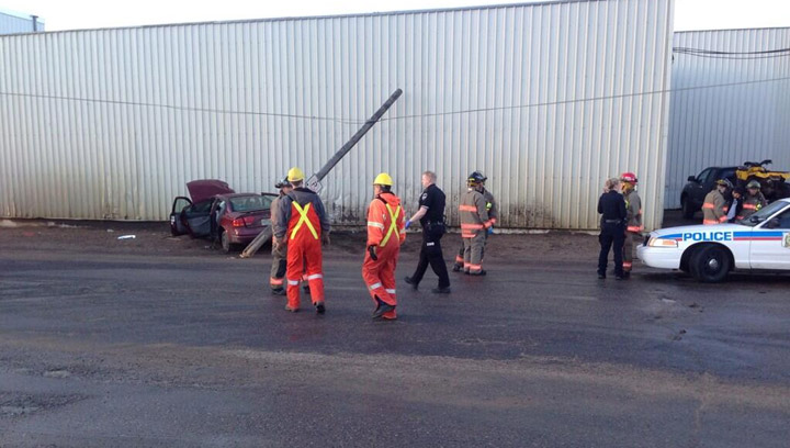 Three people were injured after a car crashed into a power pole and then a building in Saskatoon on Wednesday morning.