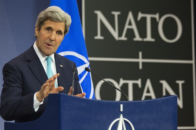 U.S. Secretary of State John Kerry speaks during a news conference at NATO Headquarters in Brussels Tuesday April 1, 2014.