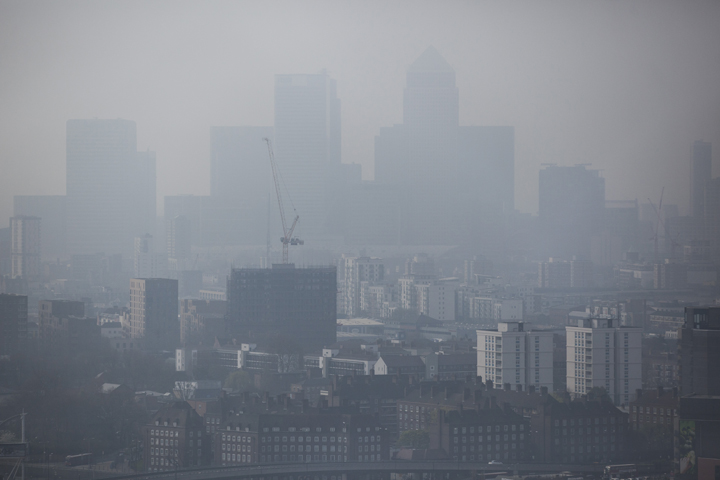 A general view through smog of the Canary Wharf financial district on April 2, 2014 in London, England. 