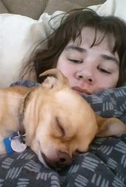 Miranda Hingston is shown with her chihuahua, Rosco.