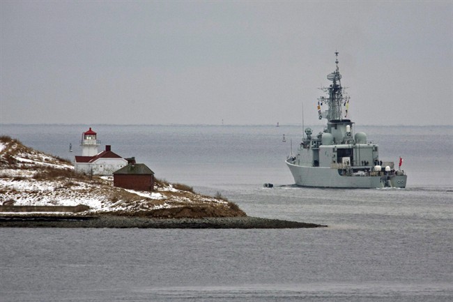 FILE - HMCS Athabaskan heads past Georges Island as it heads out of the harbour in Halifax on Jan. 14, 2010.
