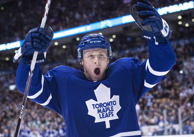 Toronto Maple Leafs defenceman Morgan Rielly celebrates his goal against the Buffalo Sabres during second period NHL hockey action in Toronto on Wednesday, January 15, 2014.