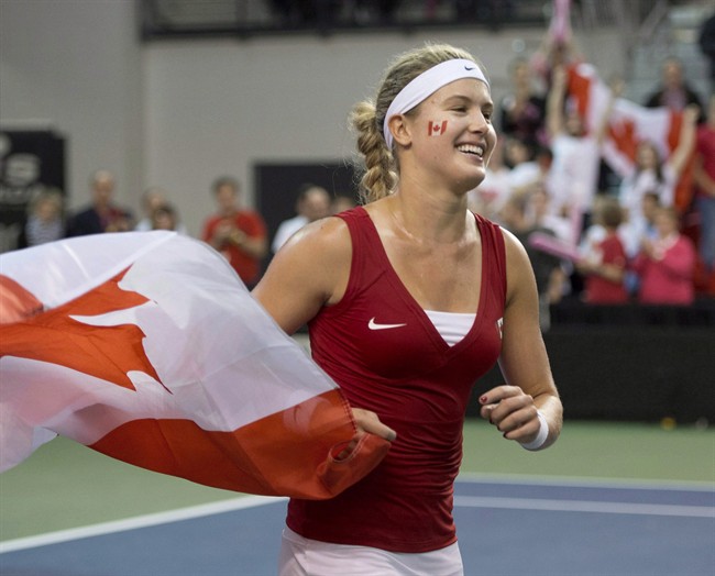 Eugenie Bouchard celebrates her win in Quebec City on Sunday, April 20, 2014. THE CANADIAN PRESS/Jacques Boissinot.