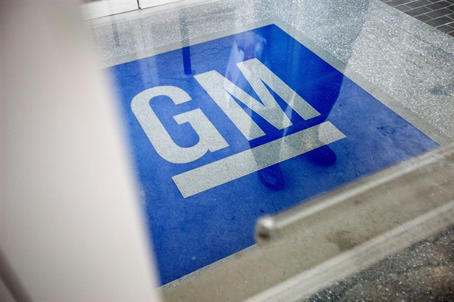 The logo for General Motors decorates the entrance at the site of a GM information technology center in Roswell, Ga. Jan. 10, 2013. 