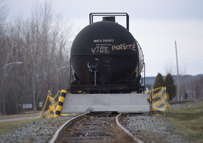 As inspected oil tanker car rests on a track in the town of Lac Megantic, Que., November 21, 2013.
