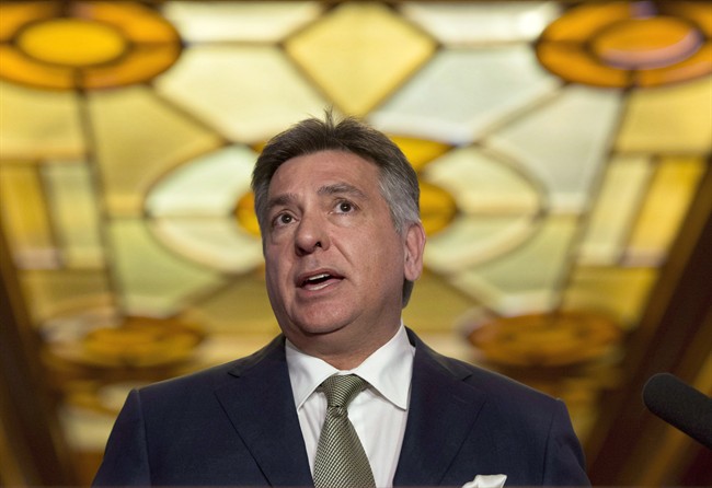Ontario Finance Minister Charles Sousa is pictured in Toronto on April 15, 2014. THE CANADIAN PRESS/Darren Calabrese.