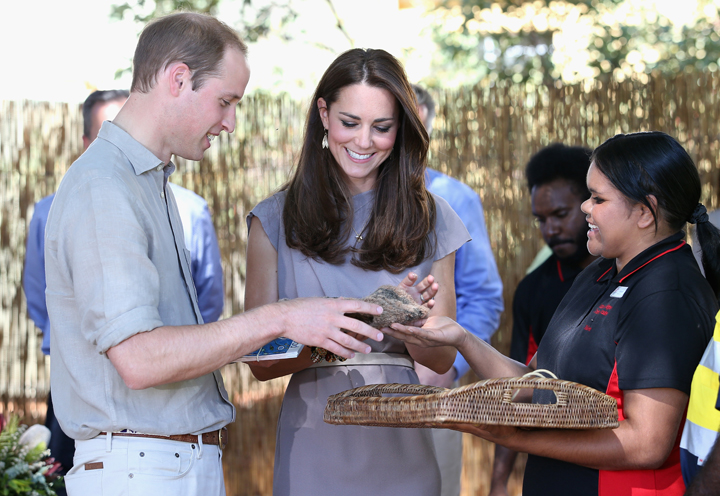 William and Kate are presented with gifts during a visit to an indigenous Training Academy.