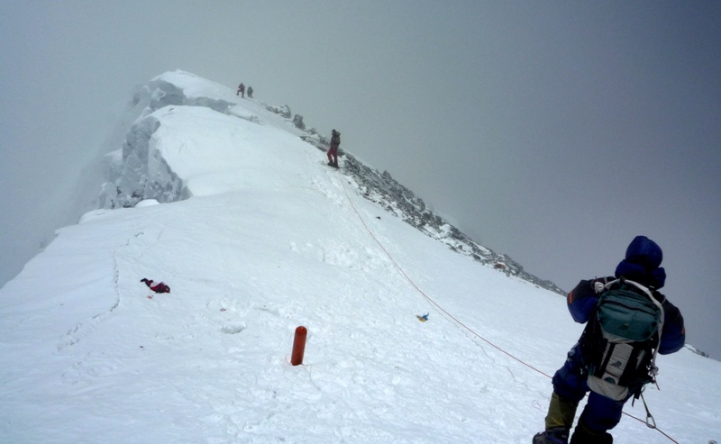 In this photograph taken on May 19, 2009, unidentified mountaineers descend from the summit of Everest. AFP PHOTO/COURTESY OF PEMBA DORJE SHERPA/FILES