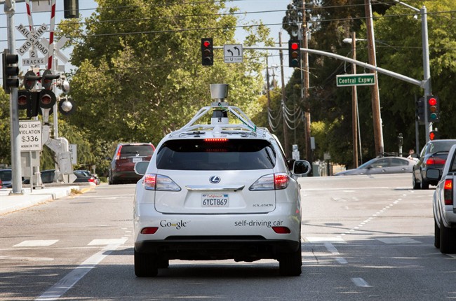 This Wednesday, April 23, 2014 photo provided by Google shows the Google driverless car navigating along a street in Mountain View, Calif.