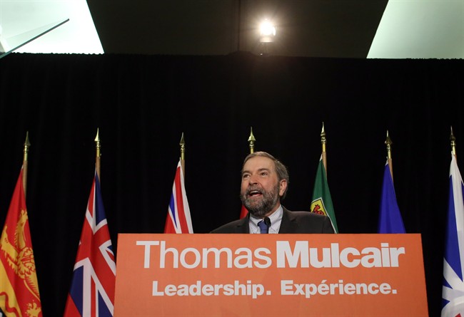 NDP Leader Tom Mulcair addresses the NDP Federal Council in Ottawa, Sunday, April 6, 2014. 