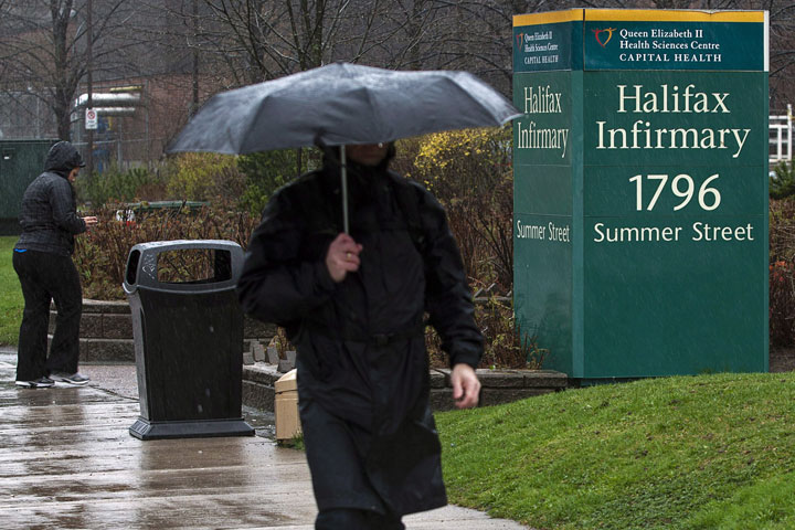 An unidentified man heads past the Halifax Infirmary on April 24, 2012.